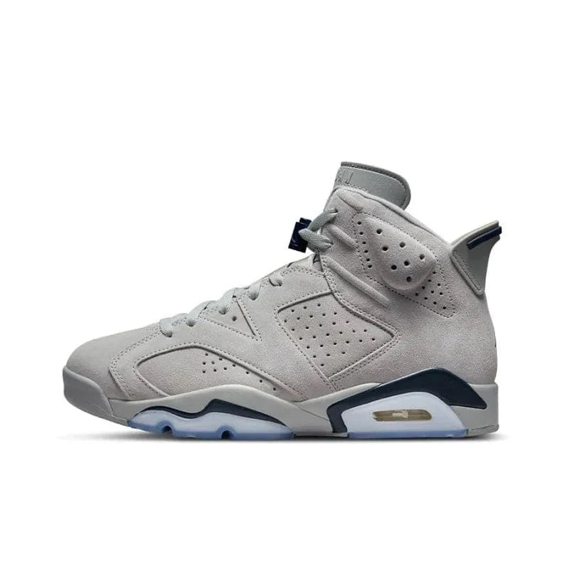 Gray sneaker with blue accents on a white background