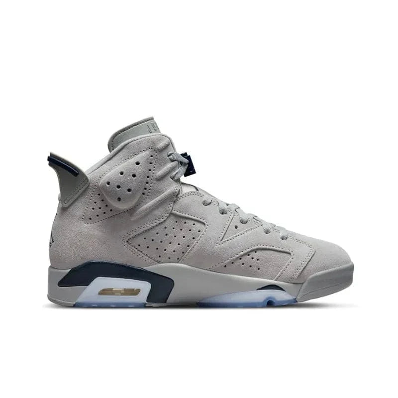 Gray sneaker with blue accents on a white background