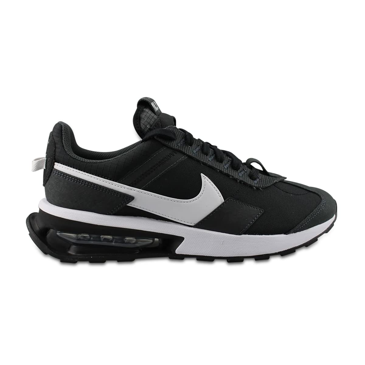 A Nike sneaker in black and white, featuring a black upper with a white Swoosh logo, a thick white midsole, and a black sole with a visible air cushion unit.