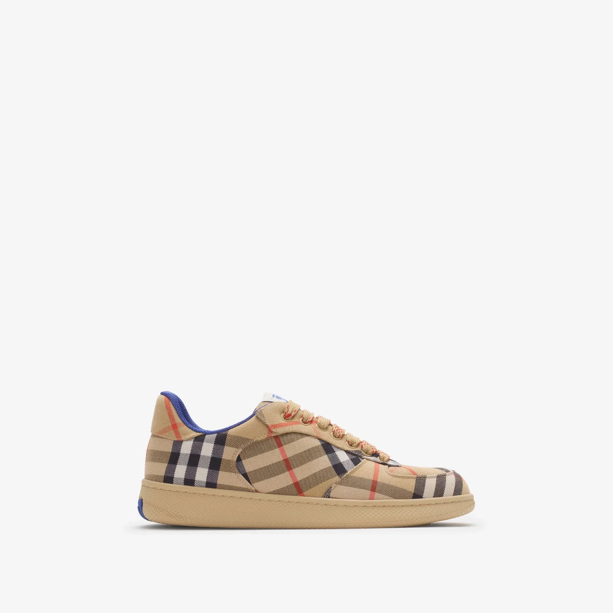 Beige sneaker with plaid pattern on a white background