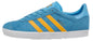 A light blue suede Gazelle sneaker with three yellow stripes, a light blue collar, and a white textured sole.