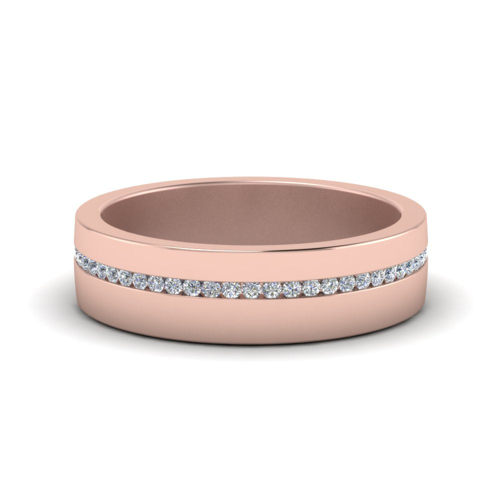Rose gold ring with diamond band on a white background