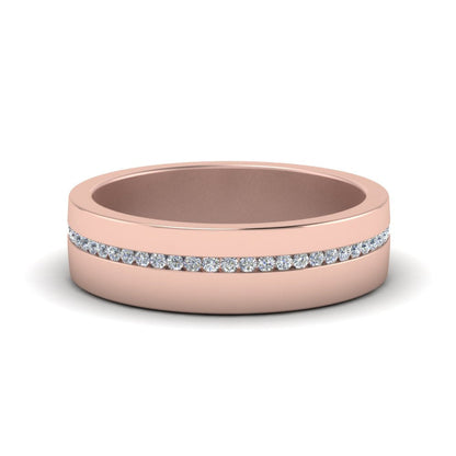 Rose gold ring with diamond band on a white background