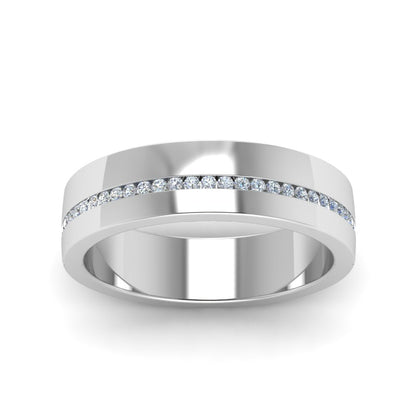 Silver ring with small diamonds on a white background