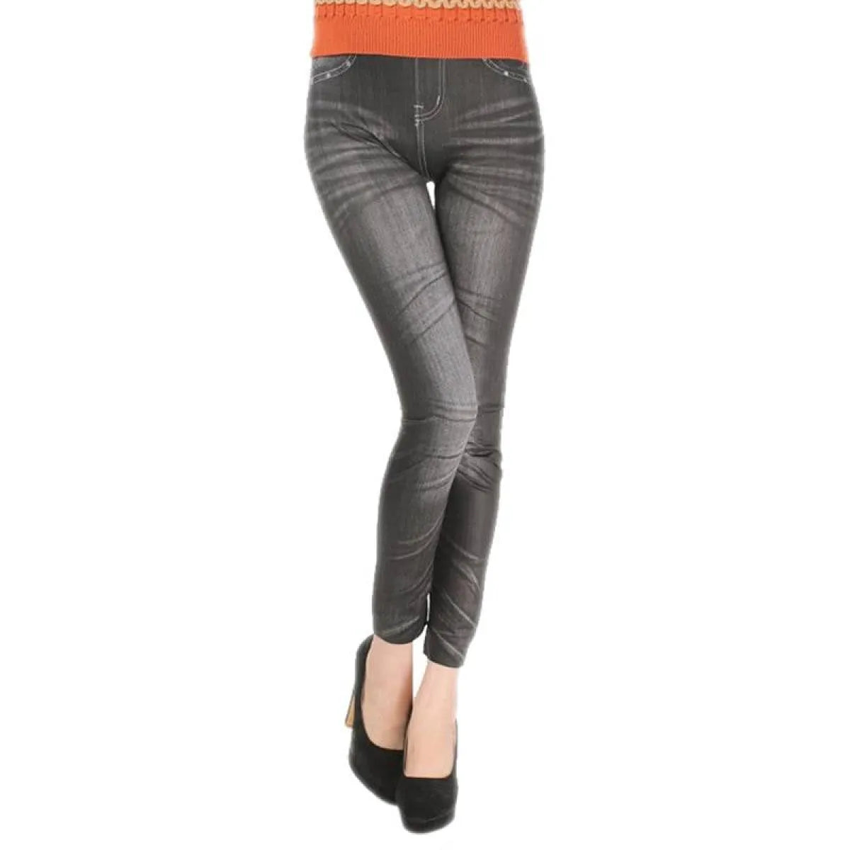 Gray leggings worn by a person on a white background