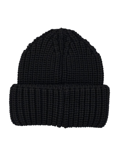 A black ribbed knit beanie hat shown against a plain white background.