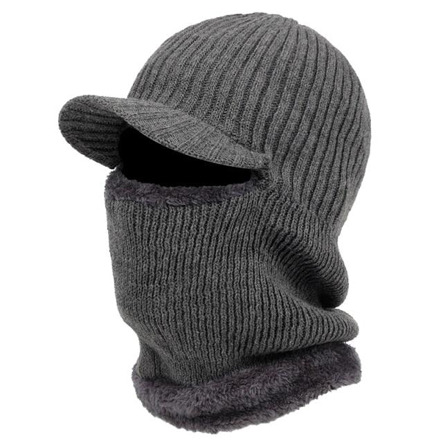 Gray knit balaclava with a cap on a white background