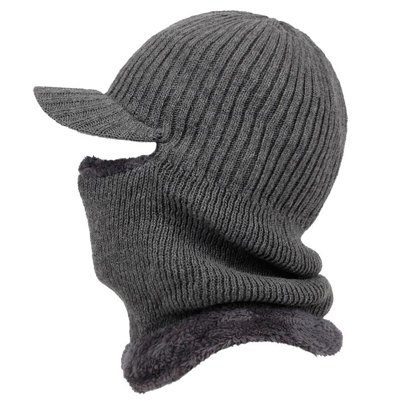 Gray knit balaclava with ear flaps on a white background