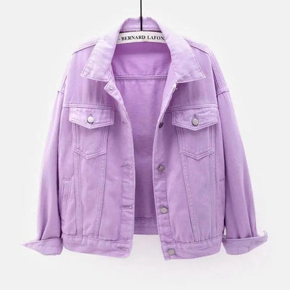 Purple denim jacket on a hanger with a white background